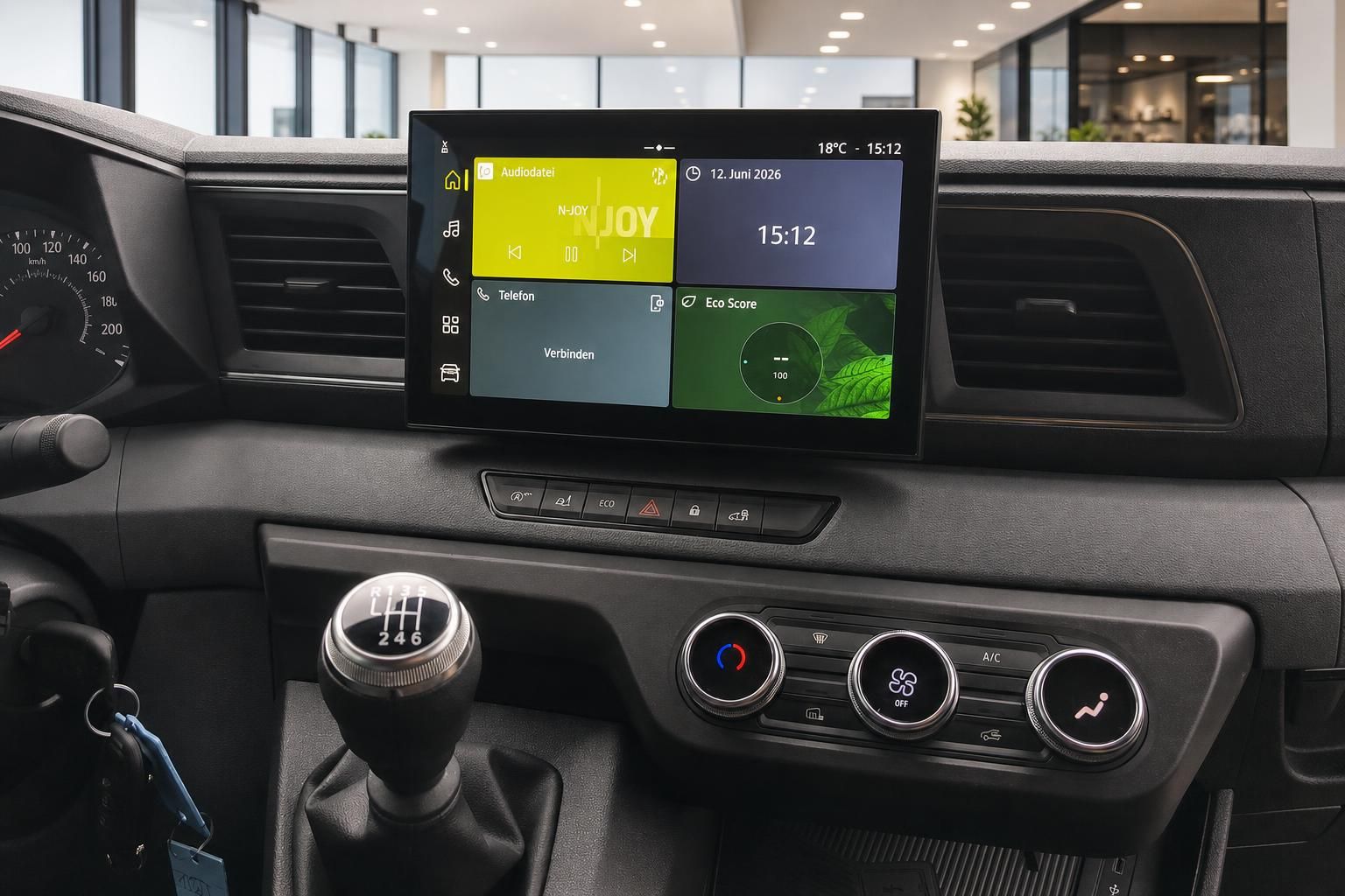 Cockpit mit Touchscreen Infotainment und Klimabedienung im Transporter