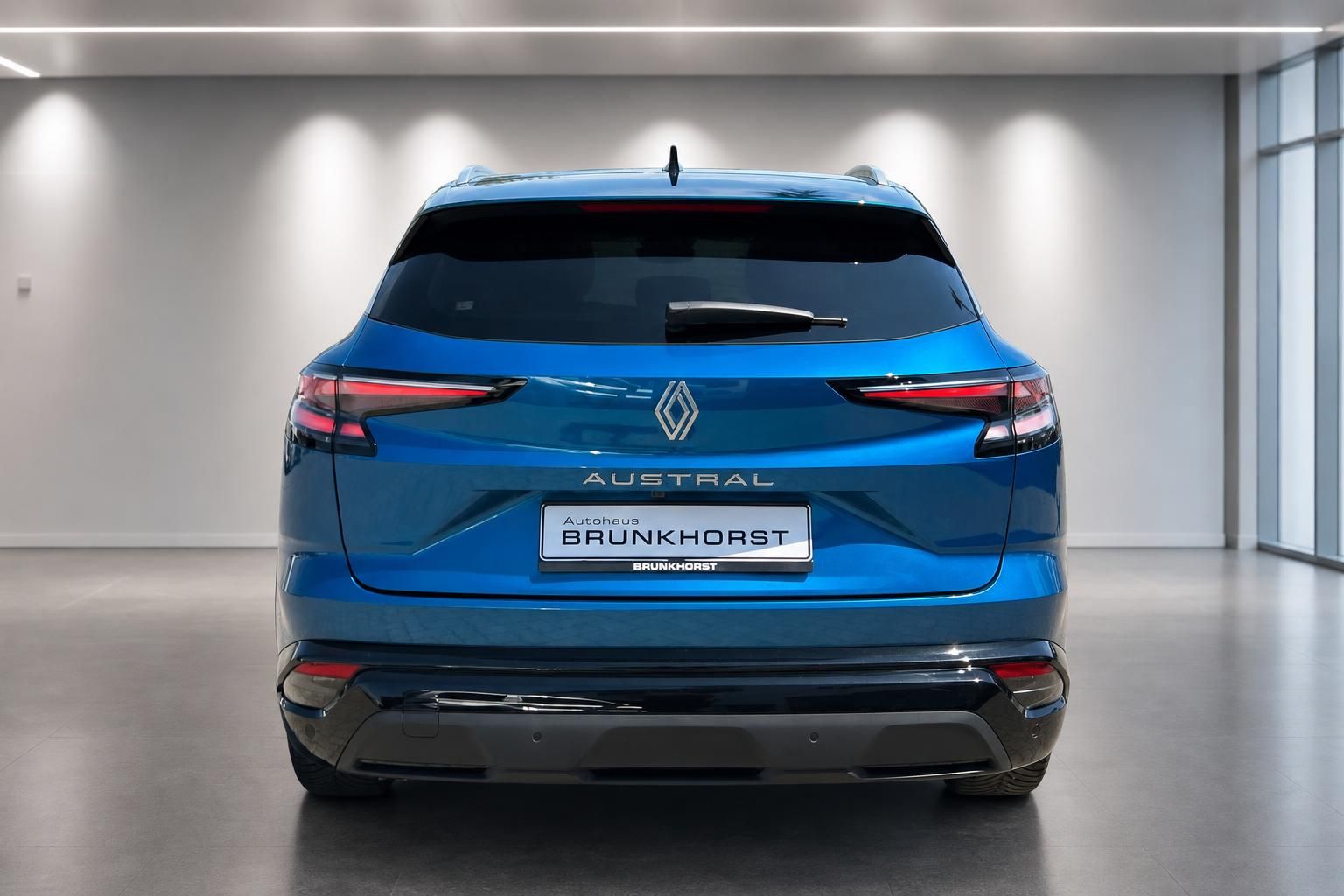 Renault Austral blau, Heckansicht mit Kennzeichenhalter Brunkhorst
