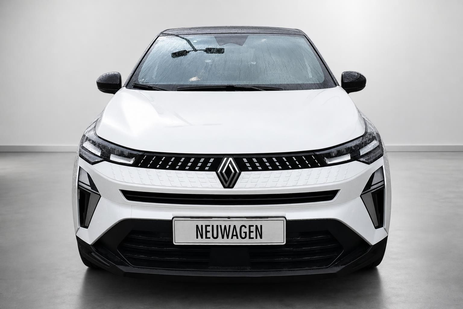 Renault Captur weiss Frontansicht mit Kuehlergrill und Logo