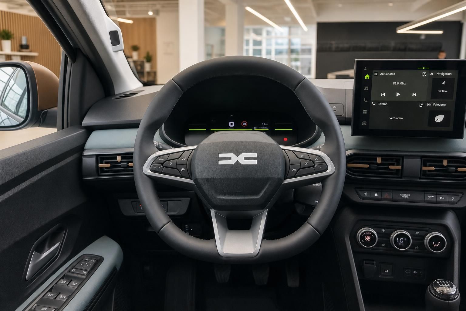 Cockpit mit Lenkrad, Digitaltacho und Infotainment-Bildschirm