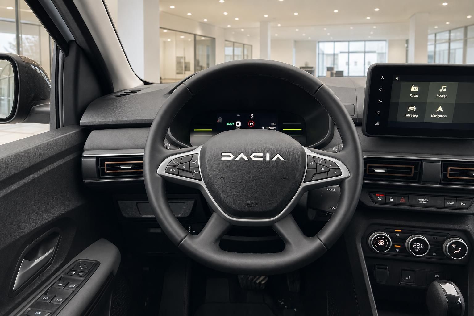 Dacia Cockpit mit Lenkrad, digitalem Tacho und Touchscreen-Infotainmentsystem