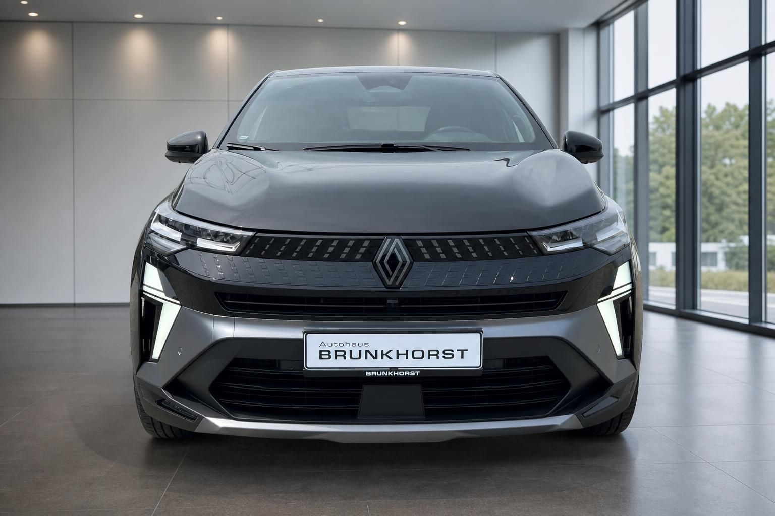 Renault Captur Frontansicht mit charakteristischem Kühlergrill und Autohaus Brunkhorst Kennzeichen