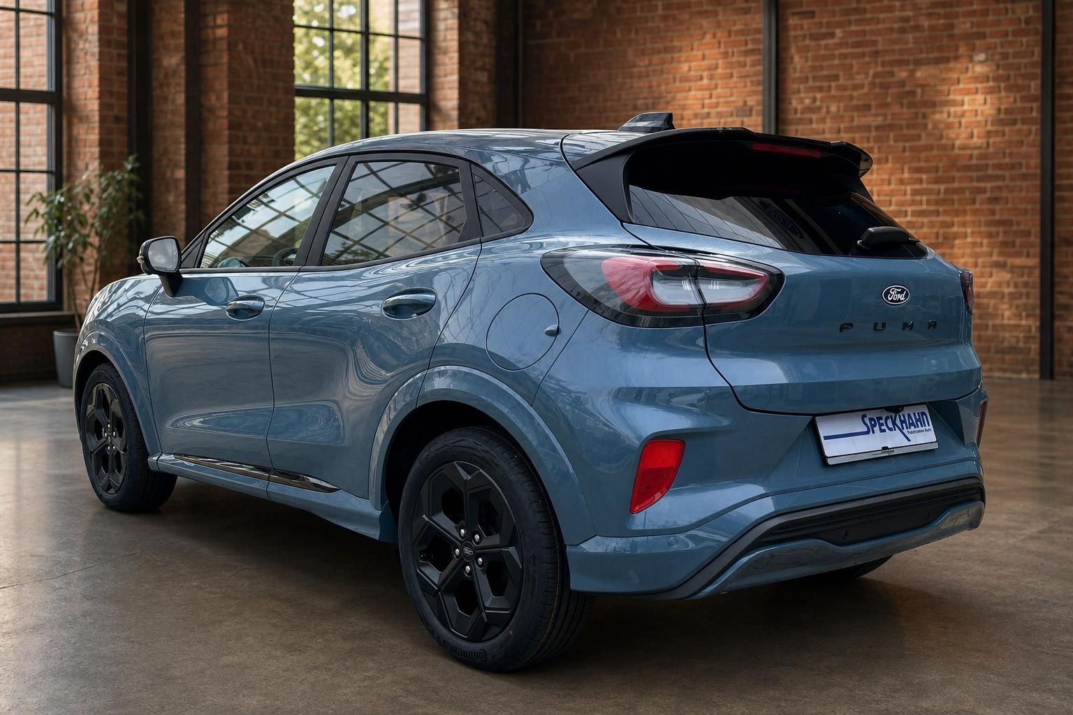 Ford Puma blau Heckansicht schräg links schwarze Felgen Sportpaket Gebrauchtwagen