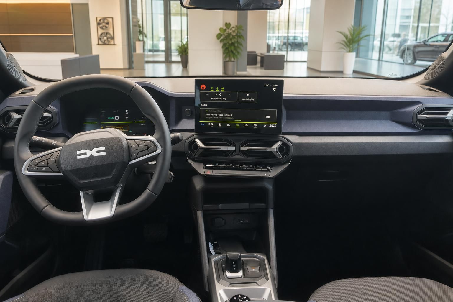 Dacia Bigster Armaturenbrett mit Touchscreen und Lenkrad Innenraumansicht