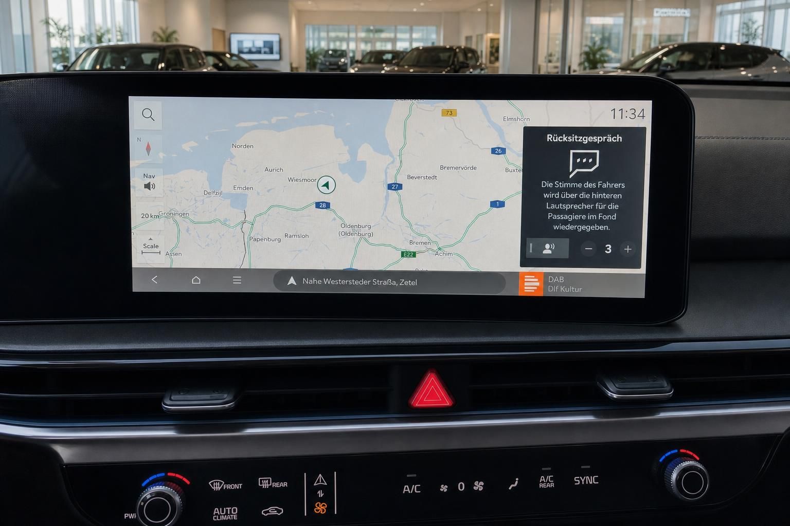 Kia Infotainment-Display mit Navigationskarte und Rücksitzgespräch-Funktion