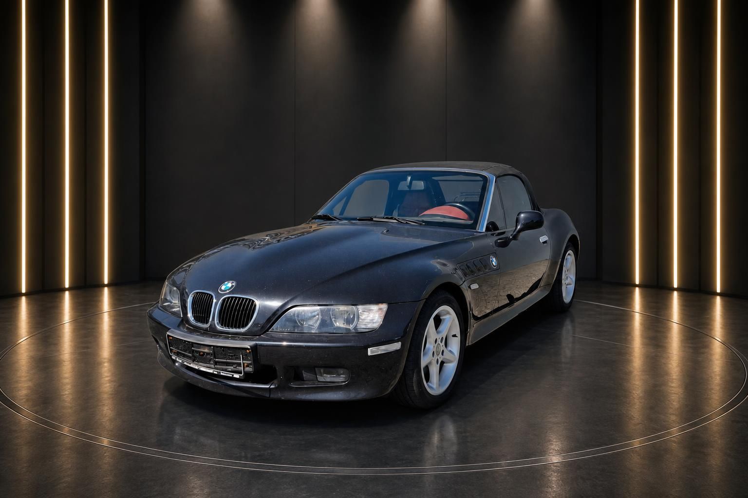 BMW Z3 Roadster schwarz mit roter Innenausstattung - Seitenansicht im Studio