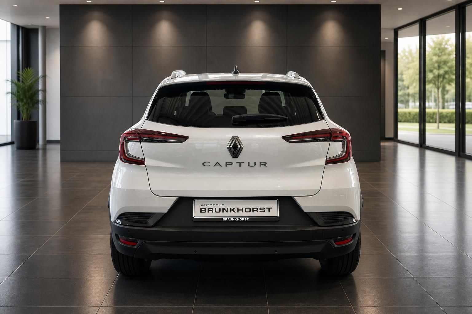 Weißer Renault Captur Heckansicht mit LED-Rücklichtern im Autohaus Brunkhorst