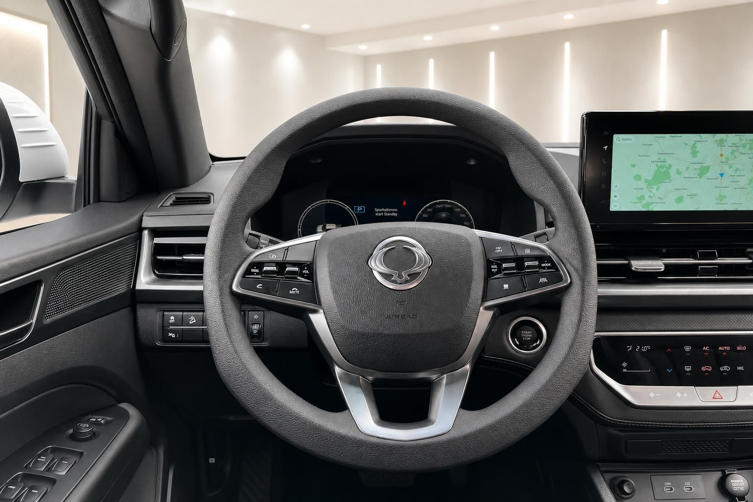 Lenkrad und Multifunktions-Display im Fahrzeuginnenraum