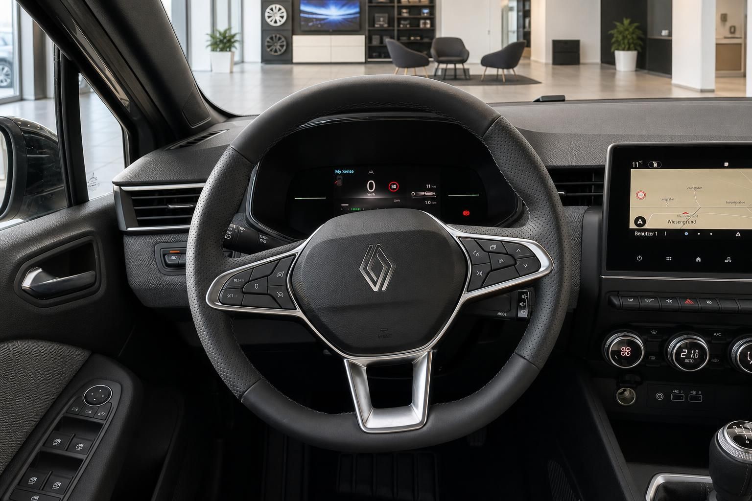 Renault Fahrzeug Cockpit mit Lenkrad, digitalem Tacho und Infotainment-System
