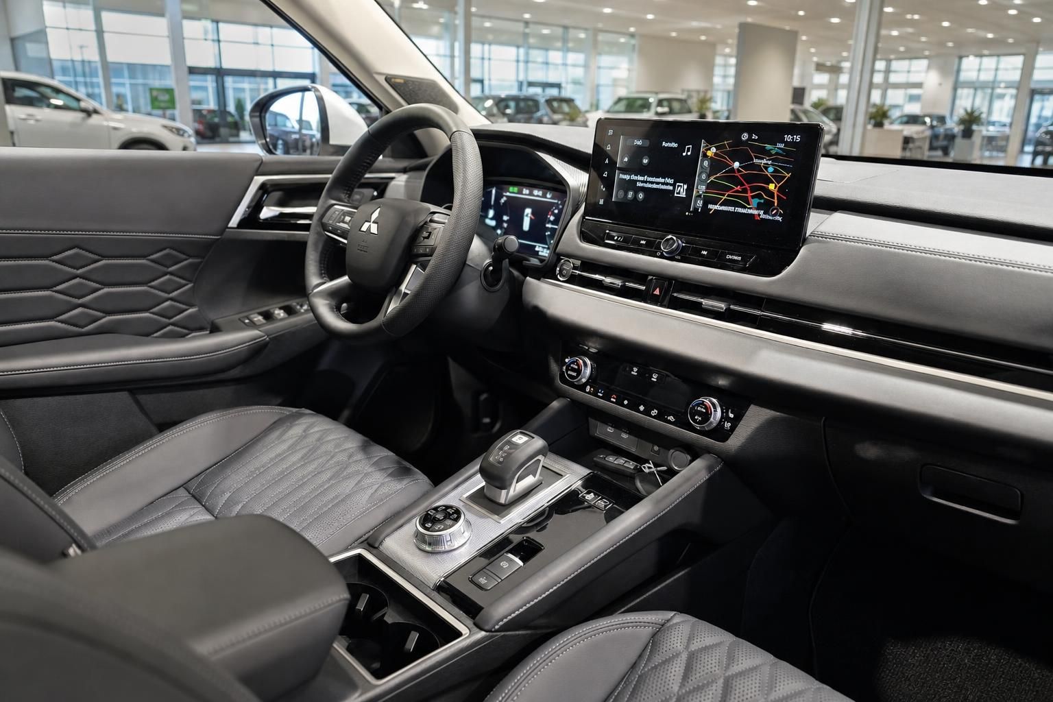 Mitsubishi Cockpit mit Lenkrad und Navigationsdisplay
