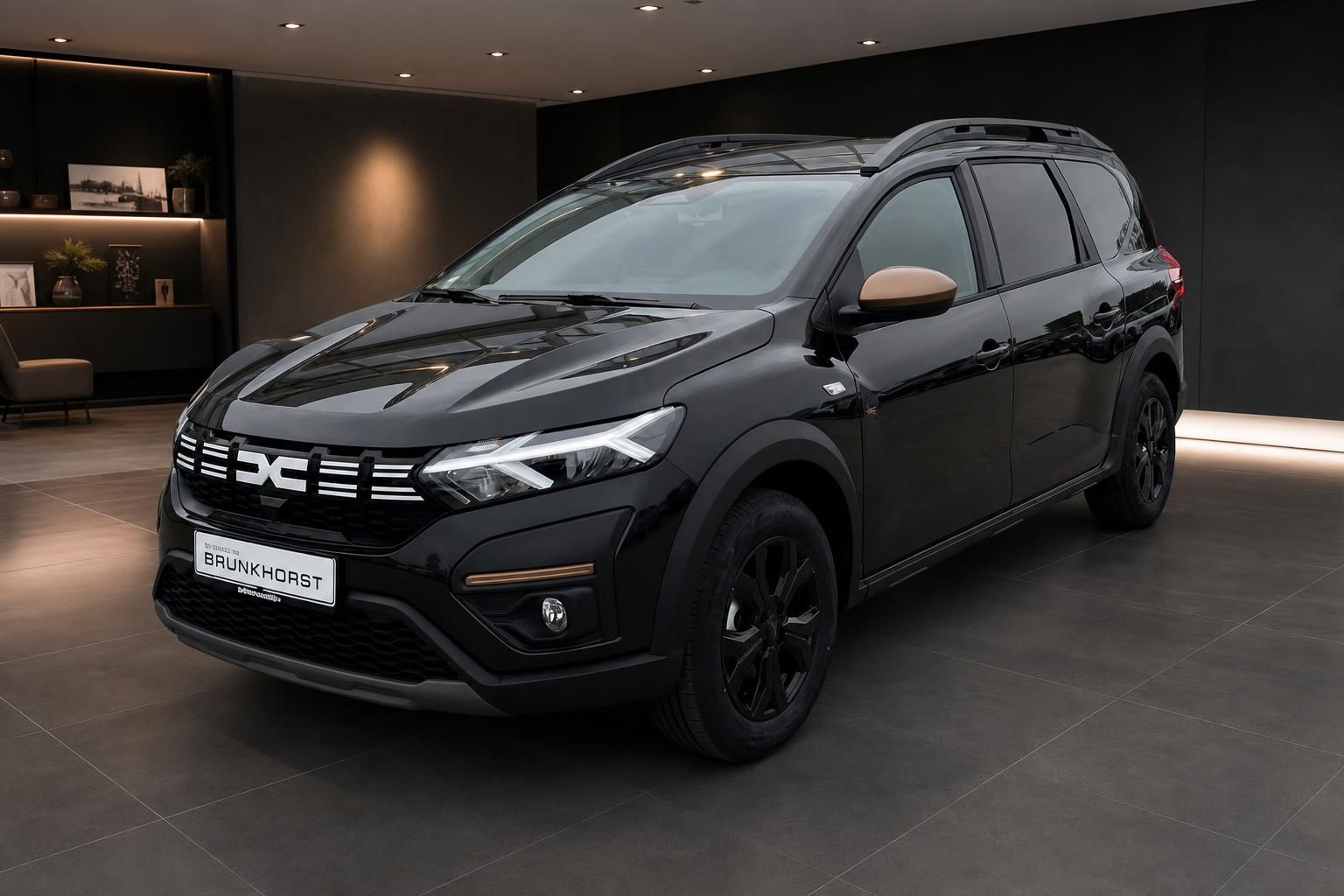 Dacia SUV schwarz - Seitenansicht in modernem Showroom