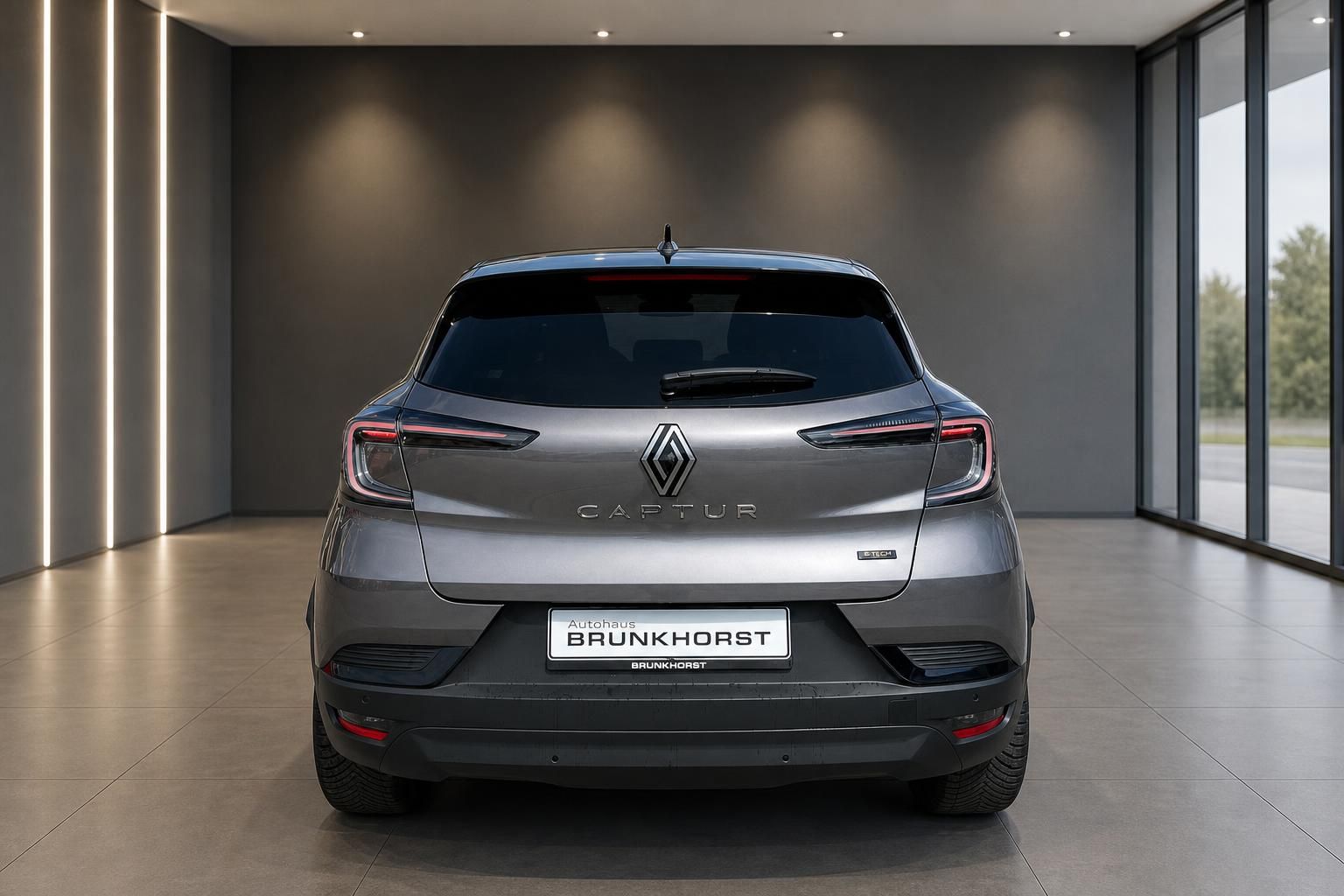 Renault Captur E-Tech grauer Elektro-SUV Heckansicht mit LED-Rückleuchten