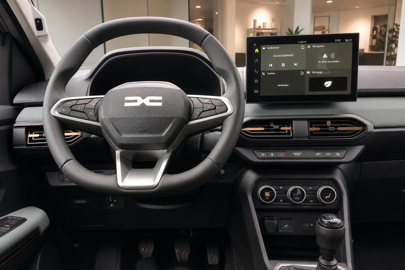 Cockpit mit Lenkrad, Multifunktionstasten und digitalem Infotainment-Display