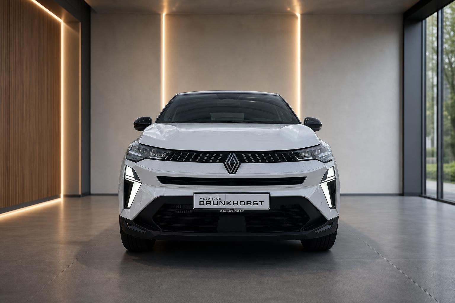 Renault Captur Frontansicht weiß mit modernem Design im Showroom