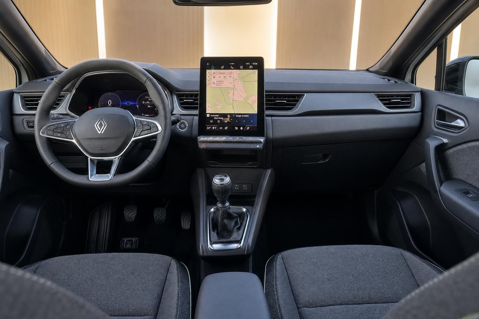 Renault Captur Innenraum mit Lenkrad, Touchscreen und schwarzen Sitzen
