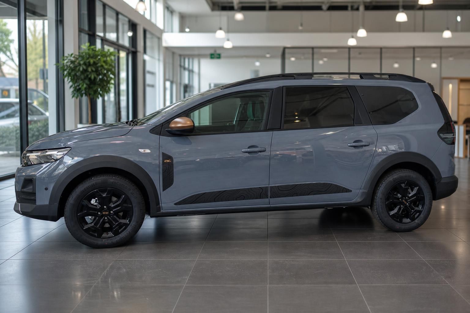 Dacia Jogger grau Seitenansicht komplett im Autohaus