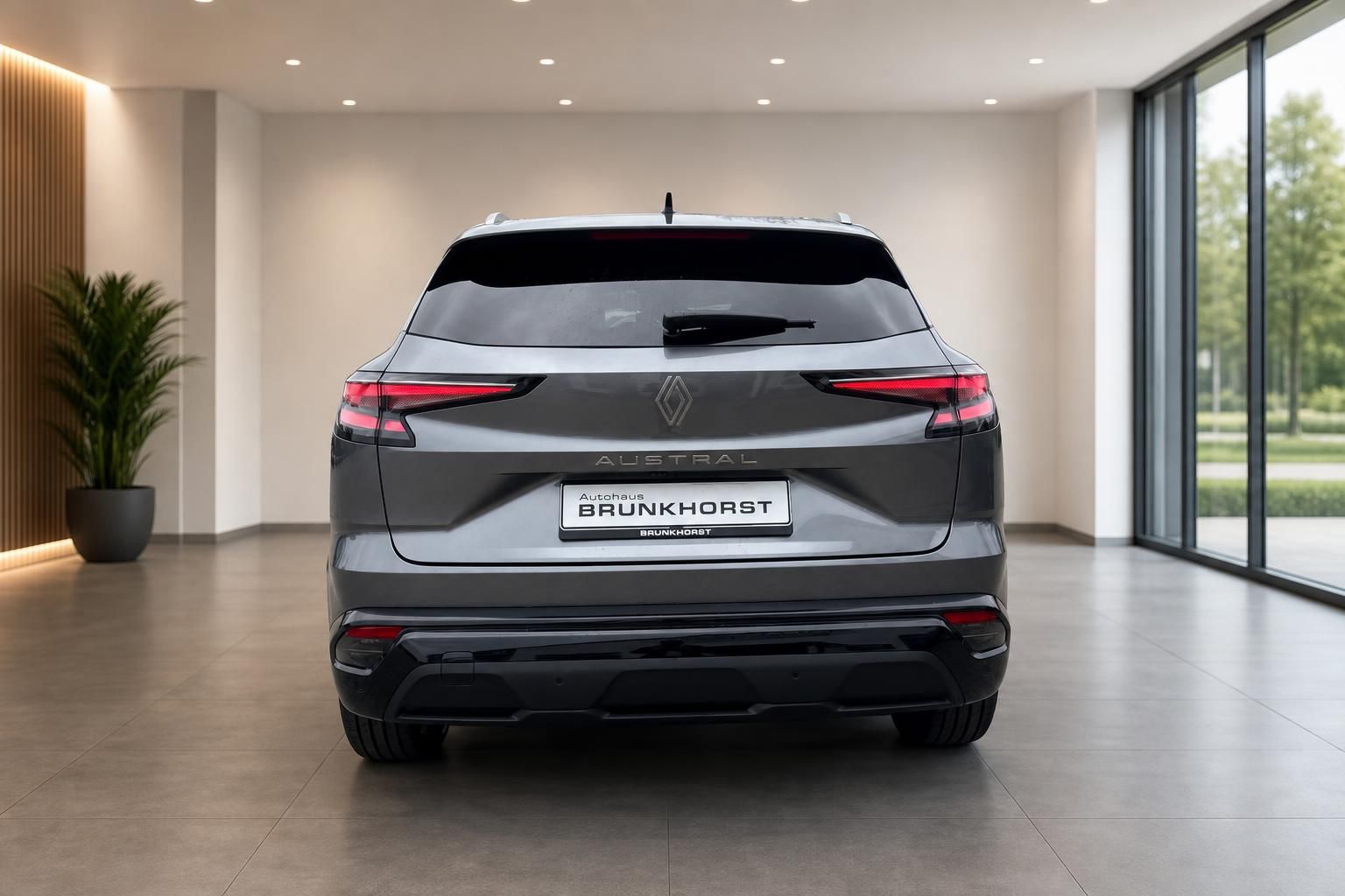 Renault Austral SUV grau Heckansicht im Autohaus Showroom mit Brunkhrost Kennzeichen