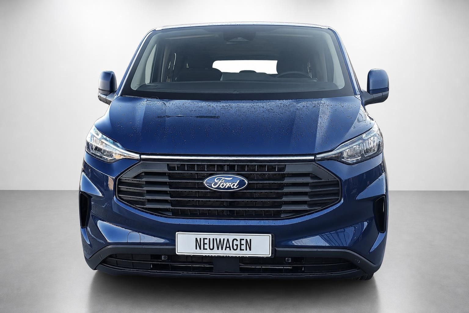 Ford Transit Custom dunkelblau Frontansicht mit Kuehlergrill
