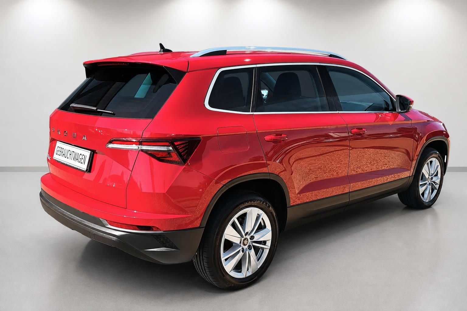 Skoda Karoq rot, Heckansicht seitlich als Gebrauchtwagen