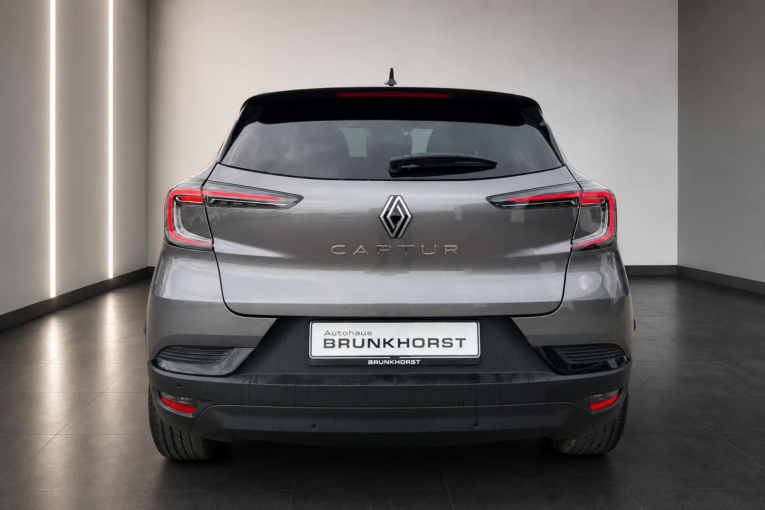 Renault Captur grau Heckansicht Autohaus Brunkhorst Kennzeichen