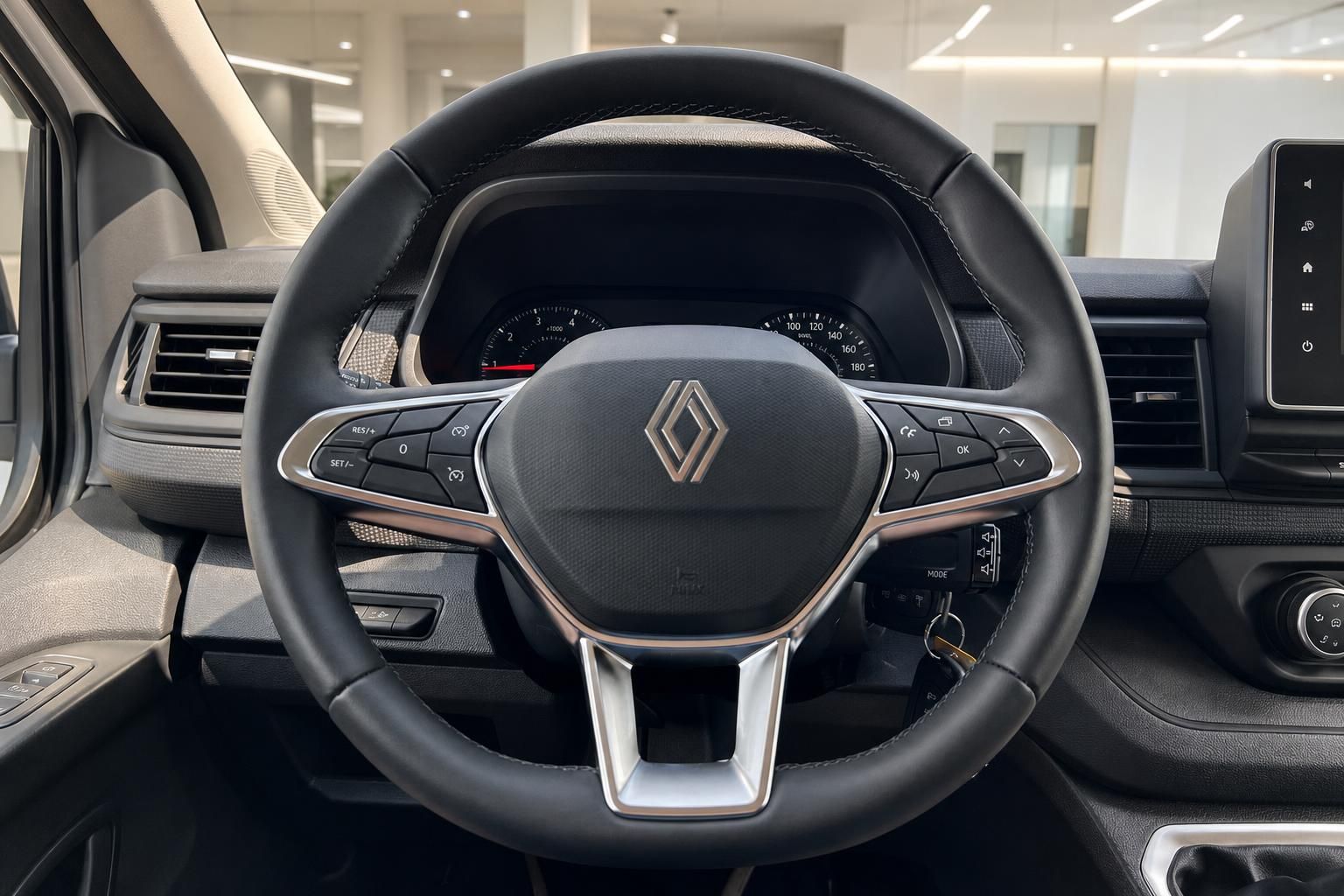 Renault Lenkrad mit Multifunktionstasten und Tachoanzeige