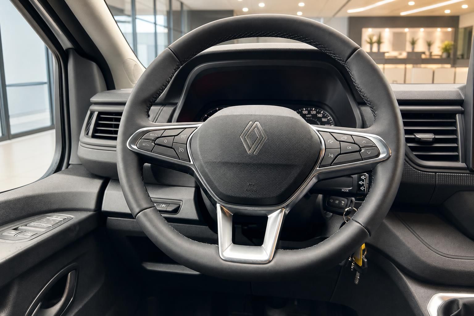 Renault Transporter Cockpit mit Lenkrad und modernem Armaturenbrett in grau-schwarzer Ausstattung