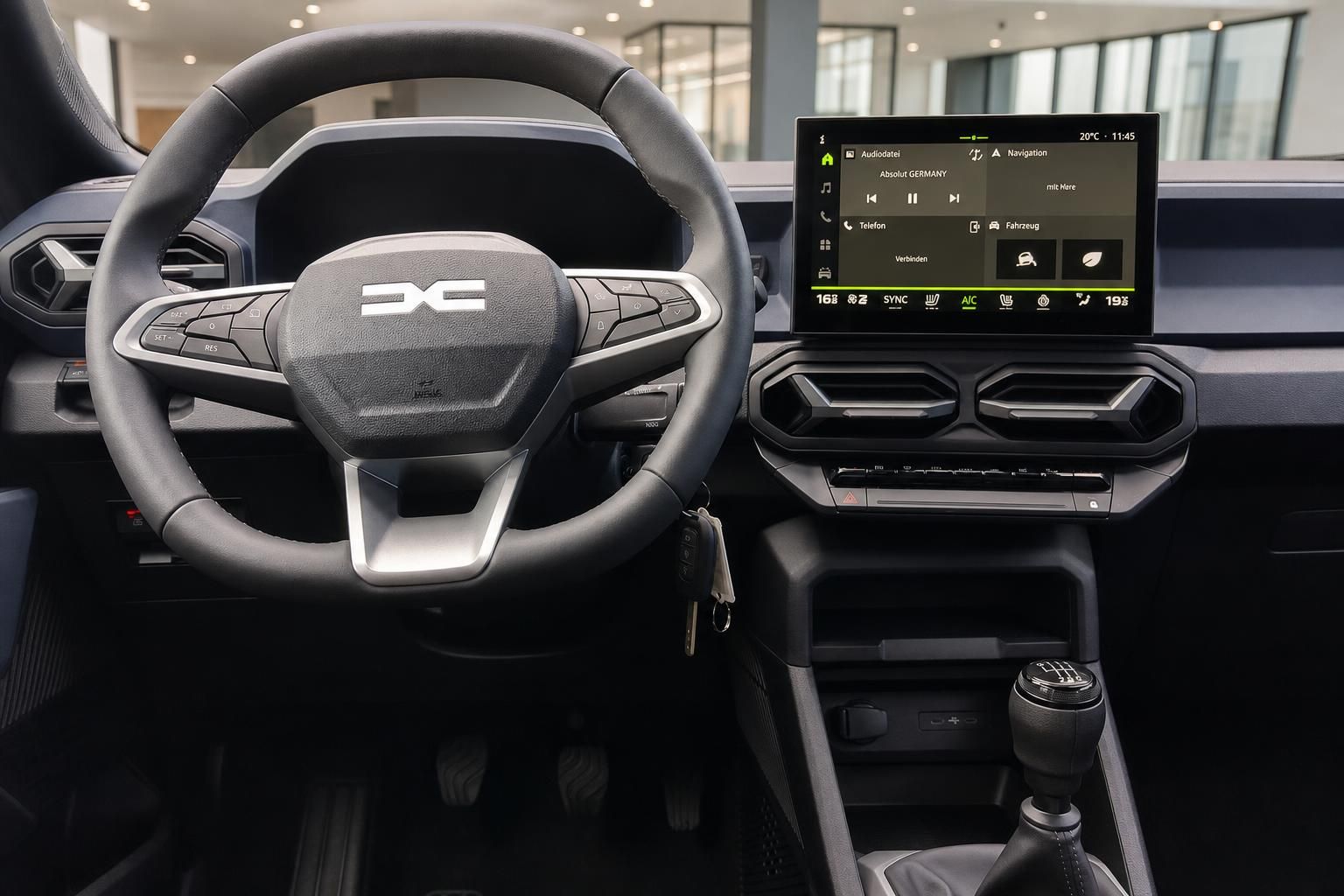 Dacia Innenraum Cockpit Lenkrad und Infotainment-Display im Detail