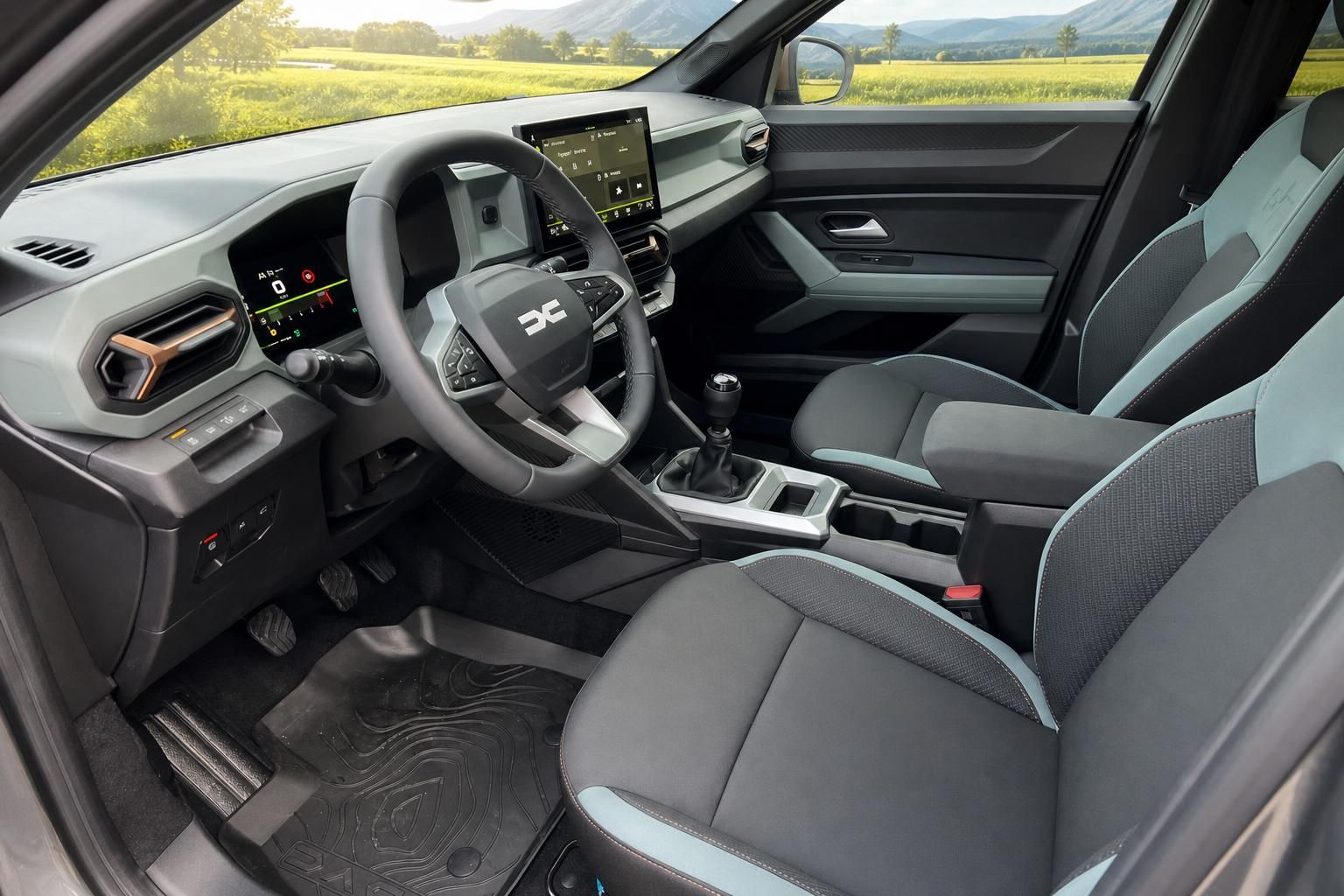 Dacia Bigster Innenraum mit modernem Cockpit, Touchscreen und Zweifarbensitzen in grau-türkis