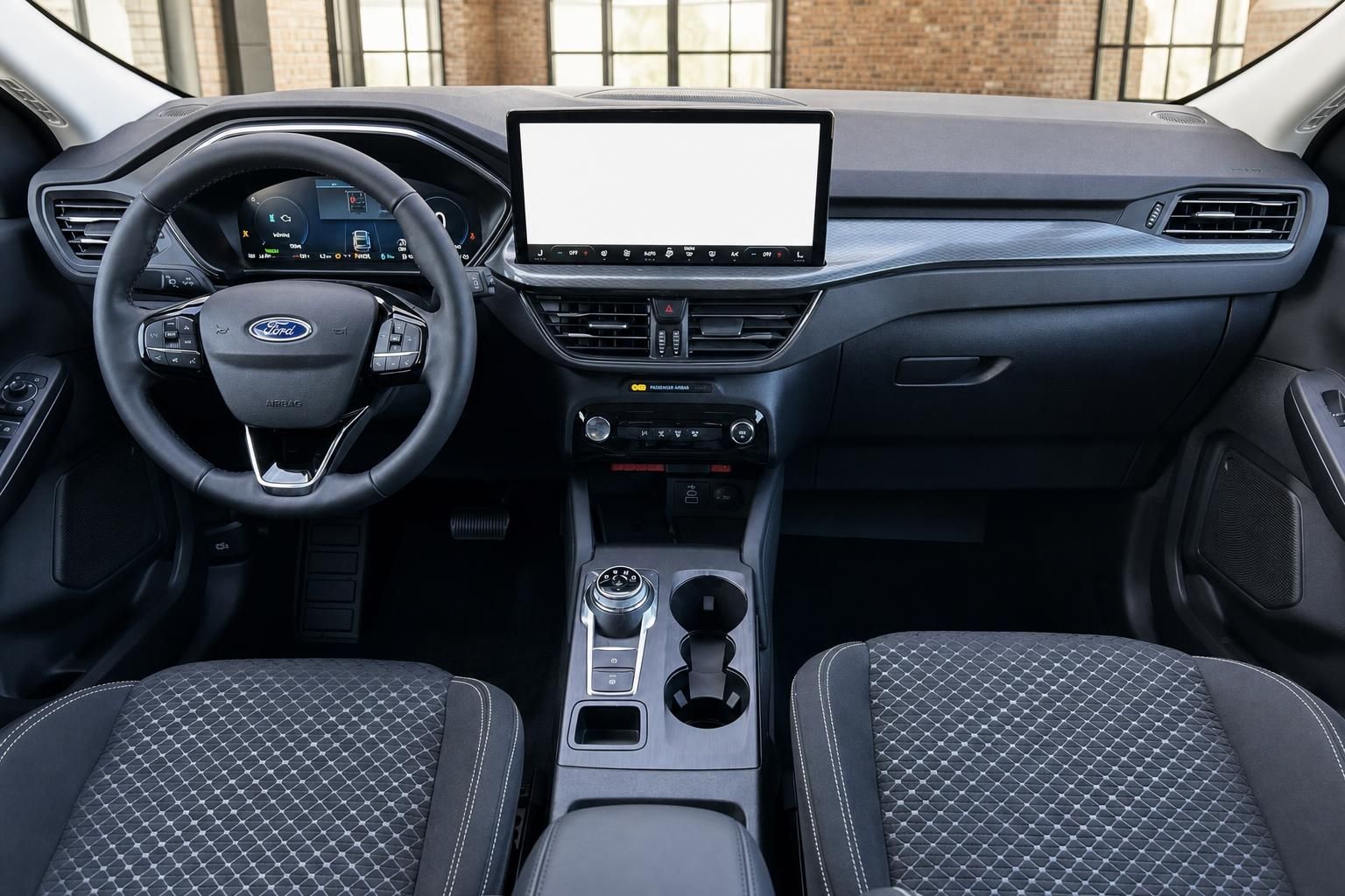 Ford Kuga Innenraum mit Ford-Lenkrad, digitalem Tacho und großem Infotainment-Display