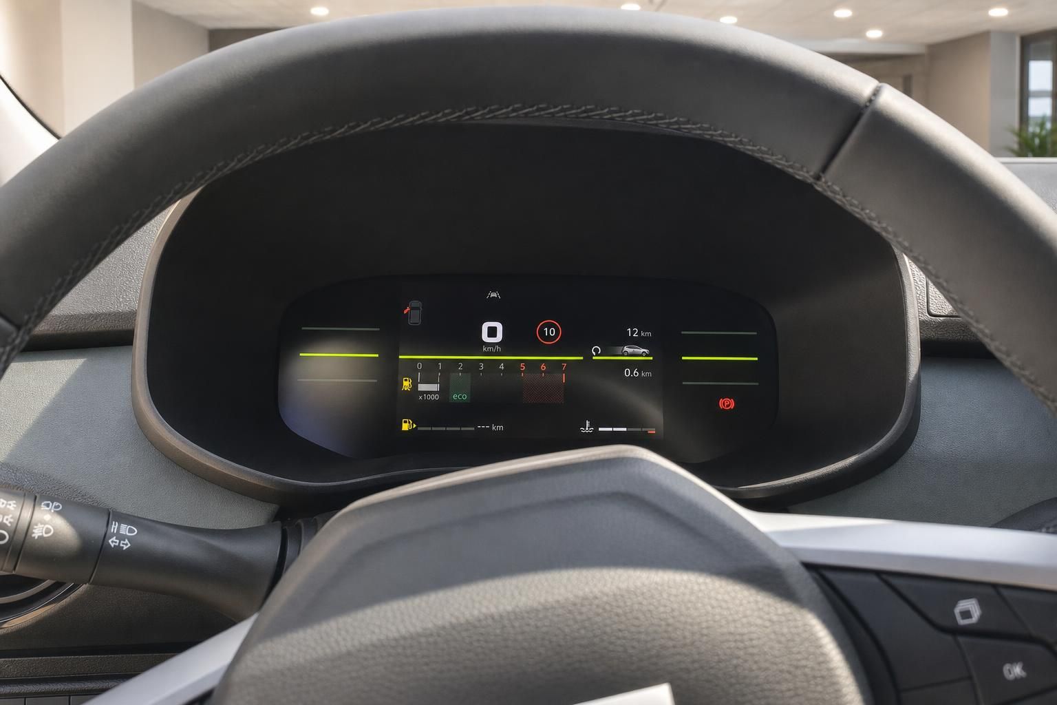 Dacia digitales Kombiinstrument hinter Lenkrad mit Drehzahlmesser, Tacho und Fahrerassistenz