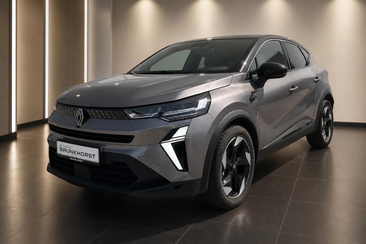 Renault Captur SUV grau Seitenansicht im Autohaus Brunkhorst mit eleganter Linienführung