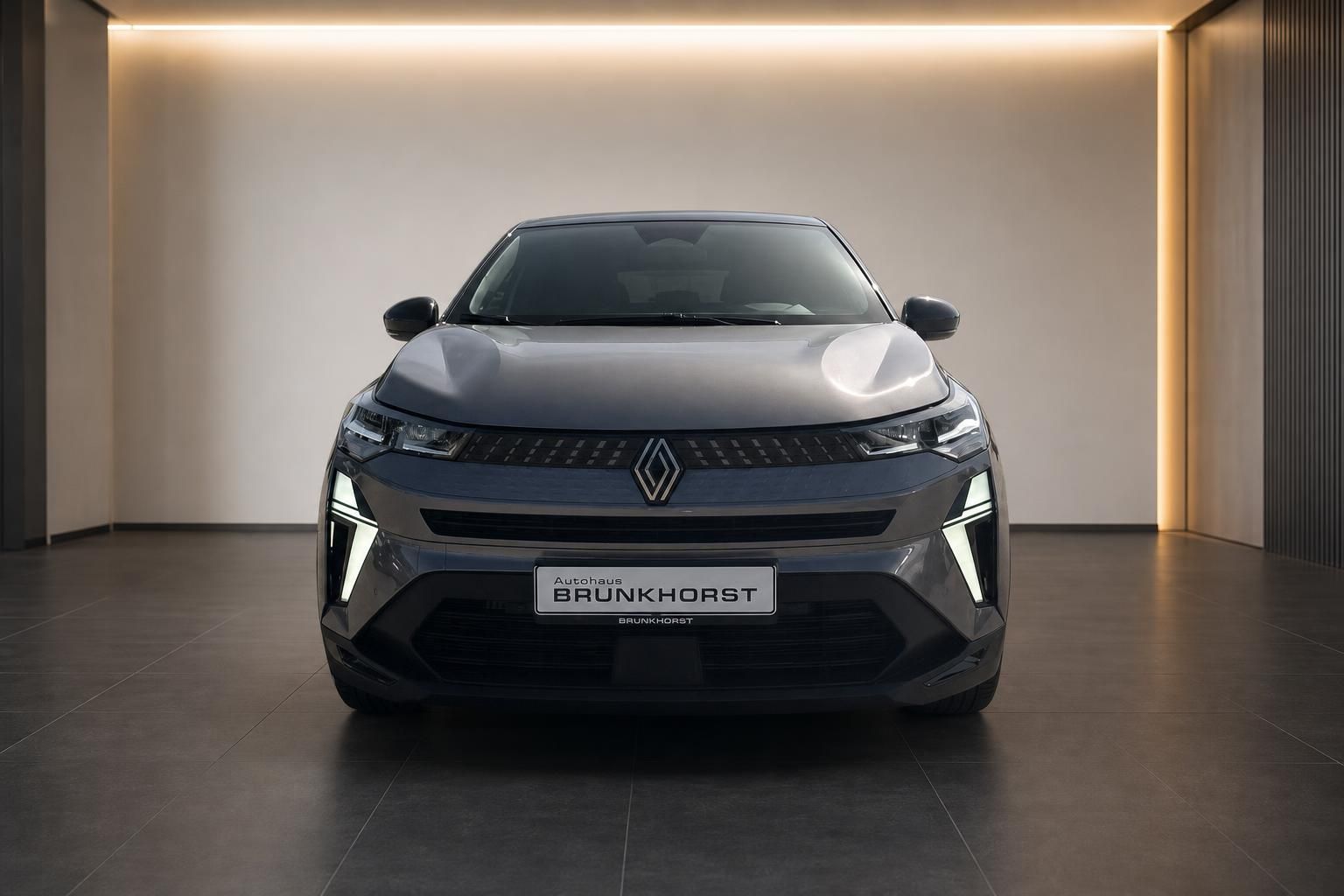 Renault Captur Frontansicht grau Autohaus Brunkhorst mit LED-Scheinwerfern und Kühlergrill