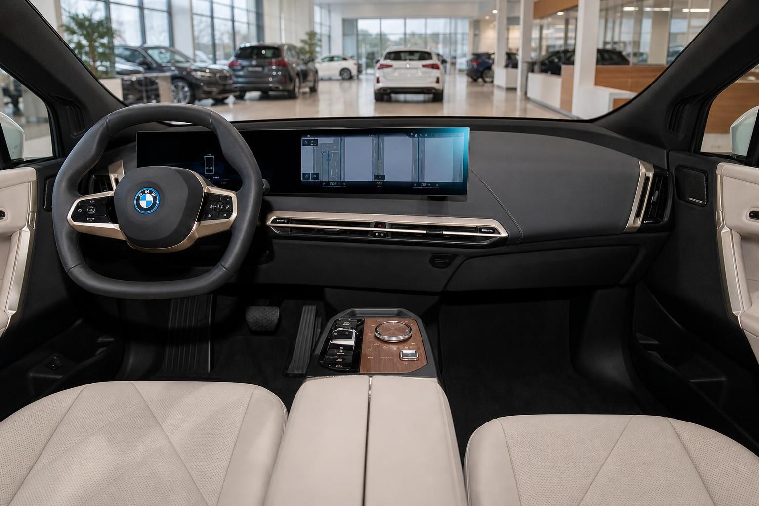 BMW iX Innenraum mit Cockpit, Lenkrad und digitalem Display