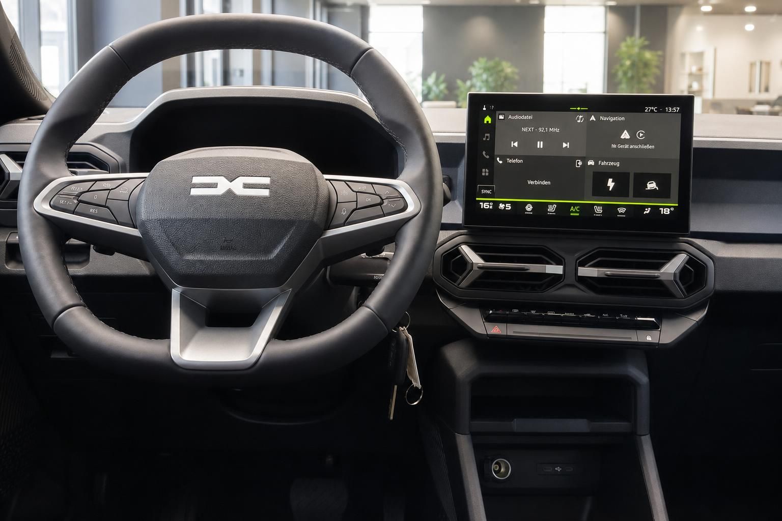 Dacia Bigster Innenraum Cockpit mit Lenkrad und Touchscreen Display