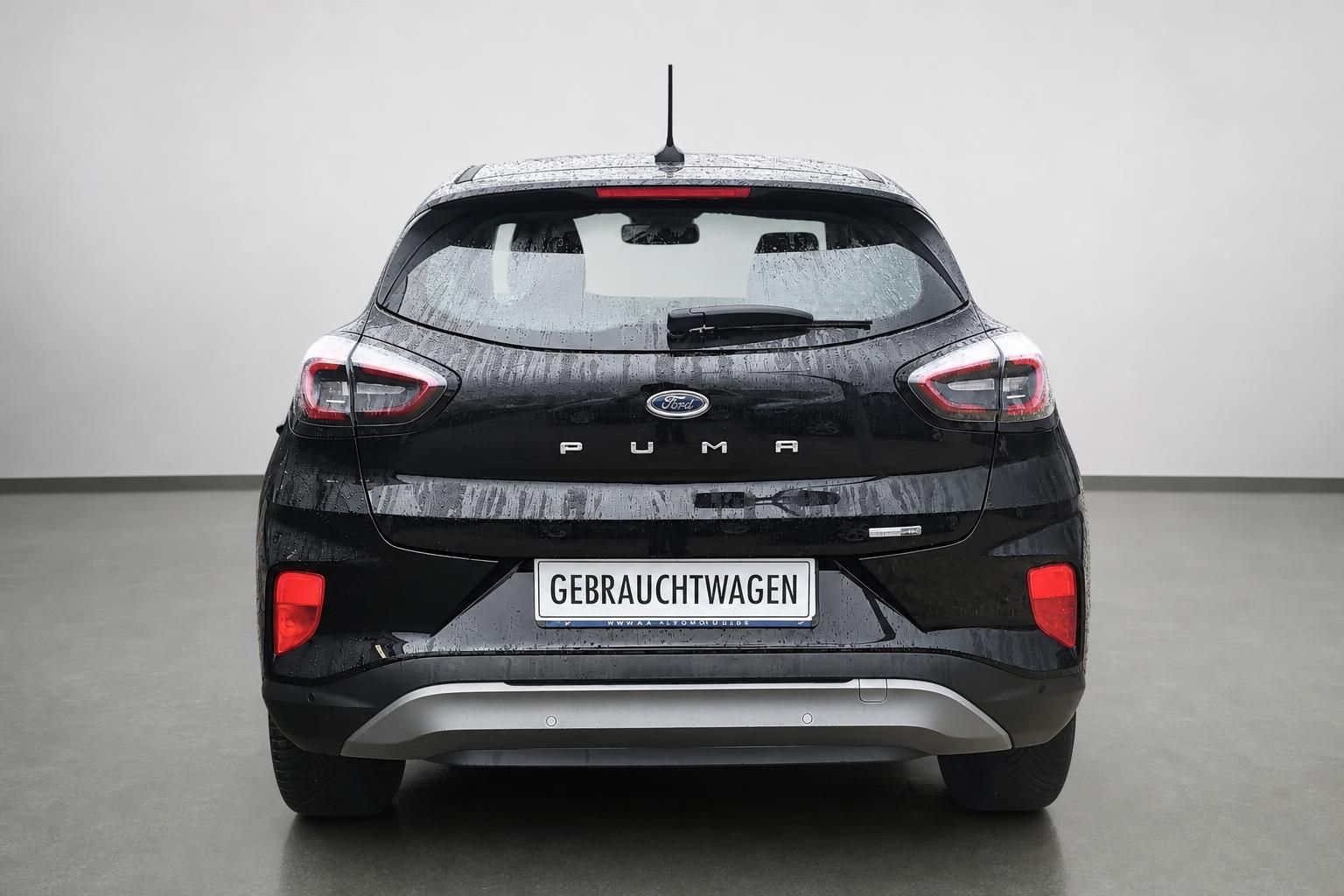 Ford Puma schwarz Heckansicht mit Gebrauchtwagen-Kennzeichen