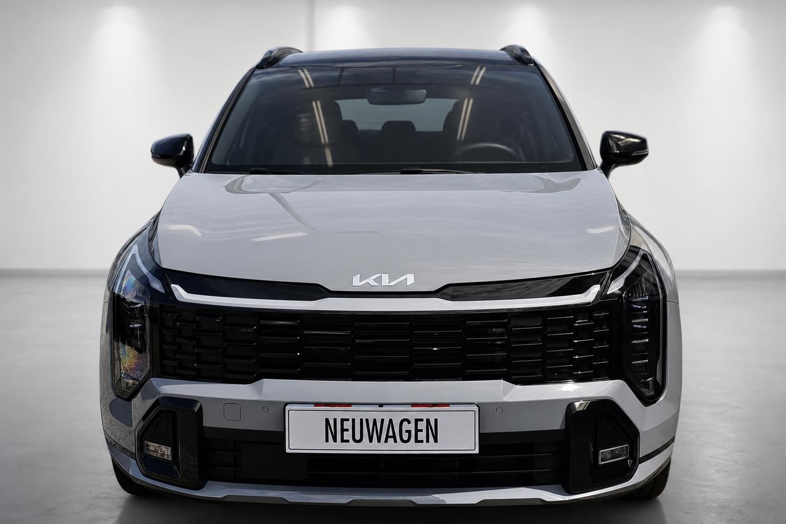 Kia Sportage Frontansicht mit Kühlergrill und LED-Scheinwerfern, silberfarben