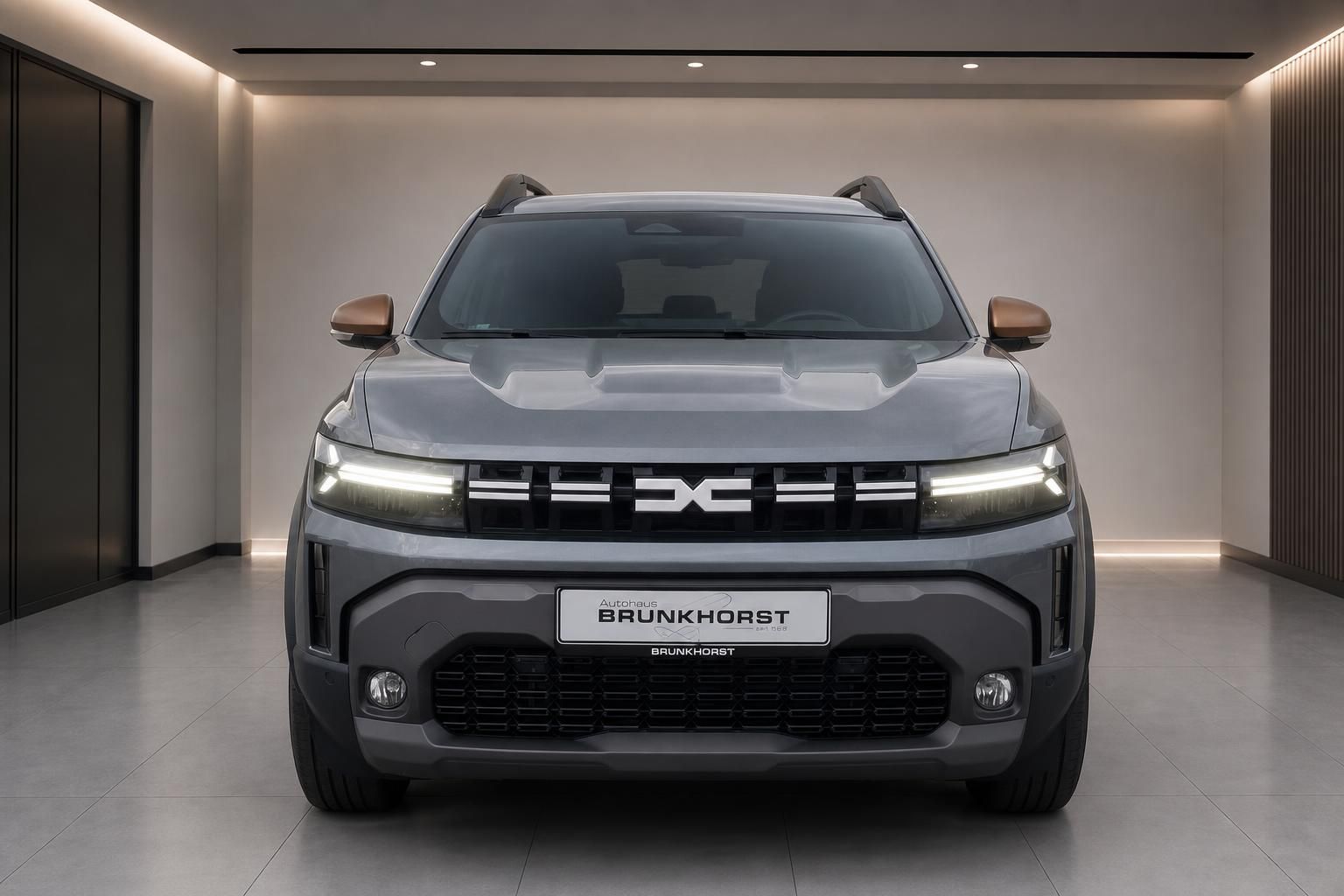 Dacia Duster grau Frontansicht mit LED-Scheinwerfern im Autohaus Brunkhorst