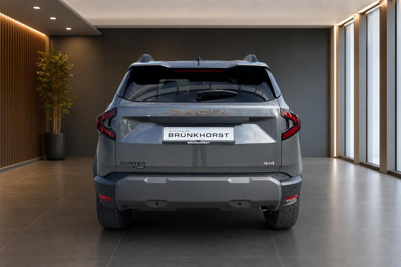 Dacia Duster Heckansicht in grau mit LED-Rückleuchten und Brunkhorst Kennzeichenhalter