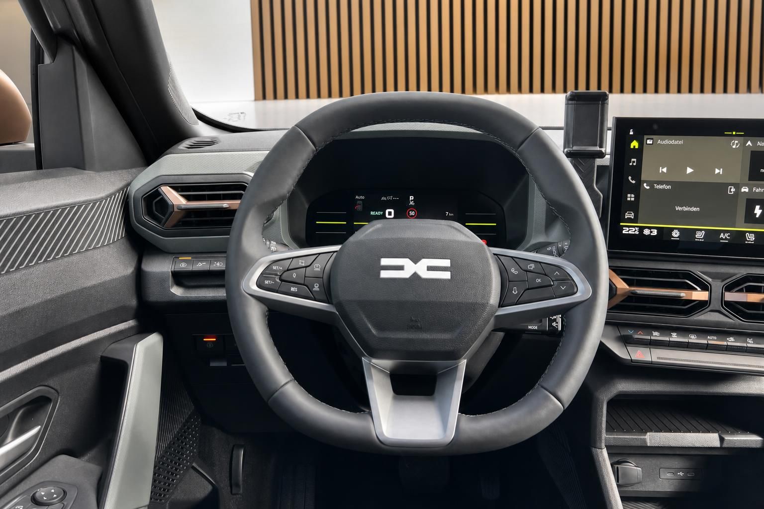 Modernes Fahrzeug-Cockpit mit digitalem Display und Lenkrad - Innenraumansicht