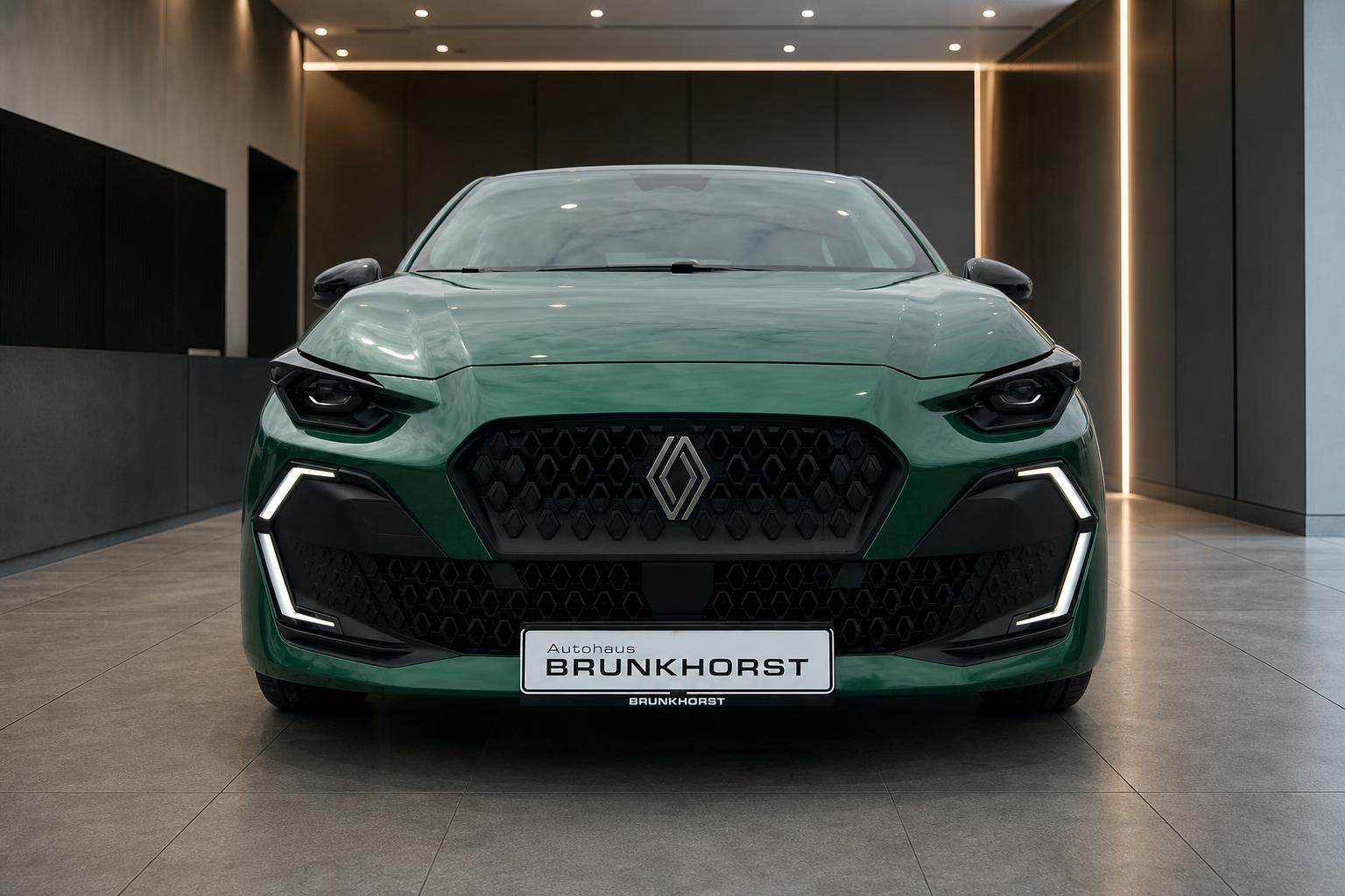 Renault Clio Frontansicht in Gruen mit markantem Kuehlergrill, Autohaus Brunkhorst