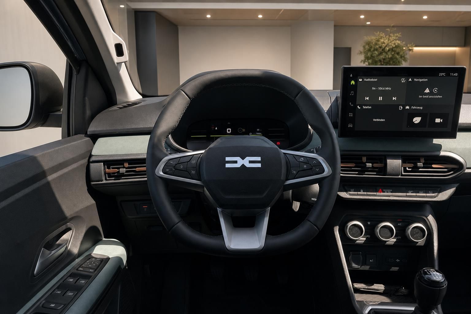 Modernes Fahrzeug-Cockpit mit digitalem Display und Lenkrad in elegantem Schwarz-Grau Design