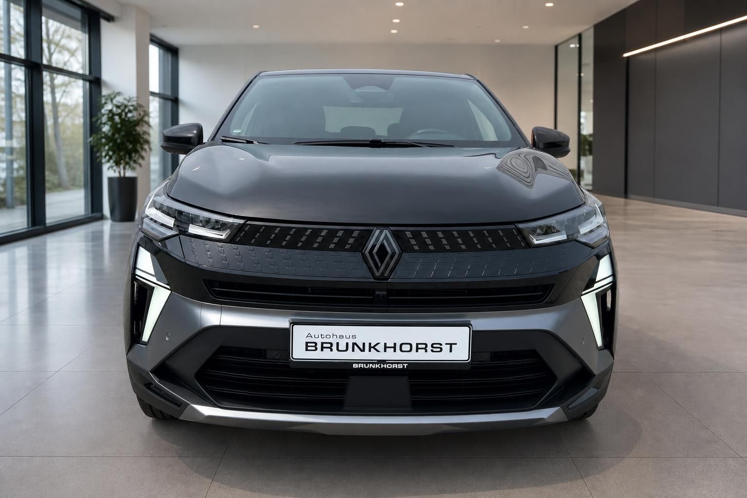 Renault Captur Frontansicht in anthrazit mit LED-Scheinwerfern und charakteristischem Kühlergrill