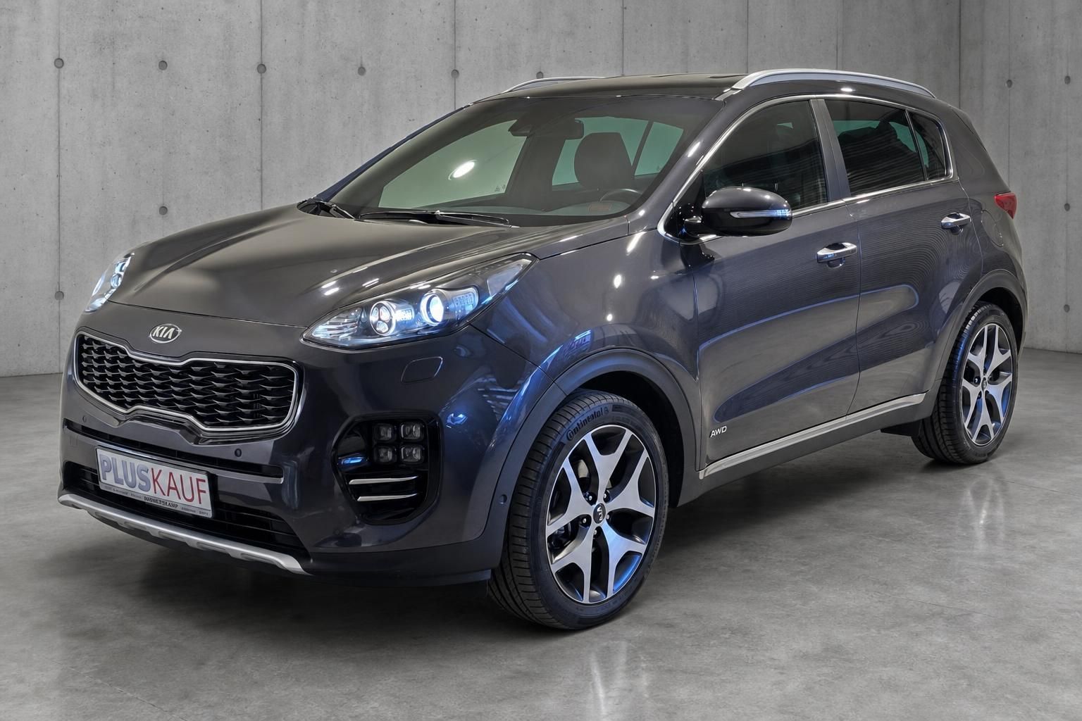 Kia Sportage AWD dunkelgrau Frontansicht schräg von vorne