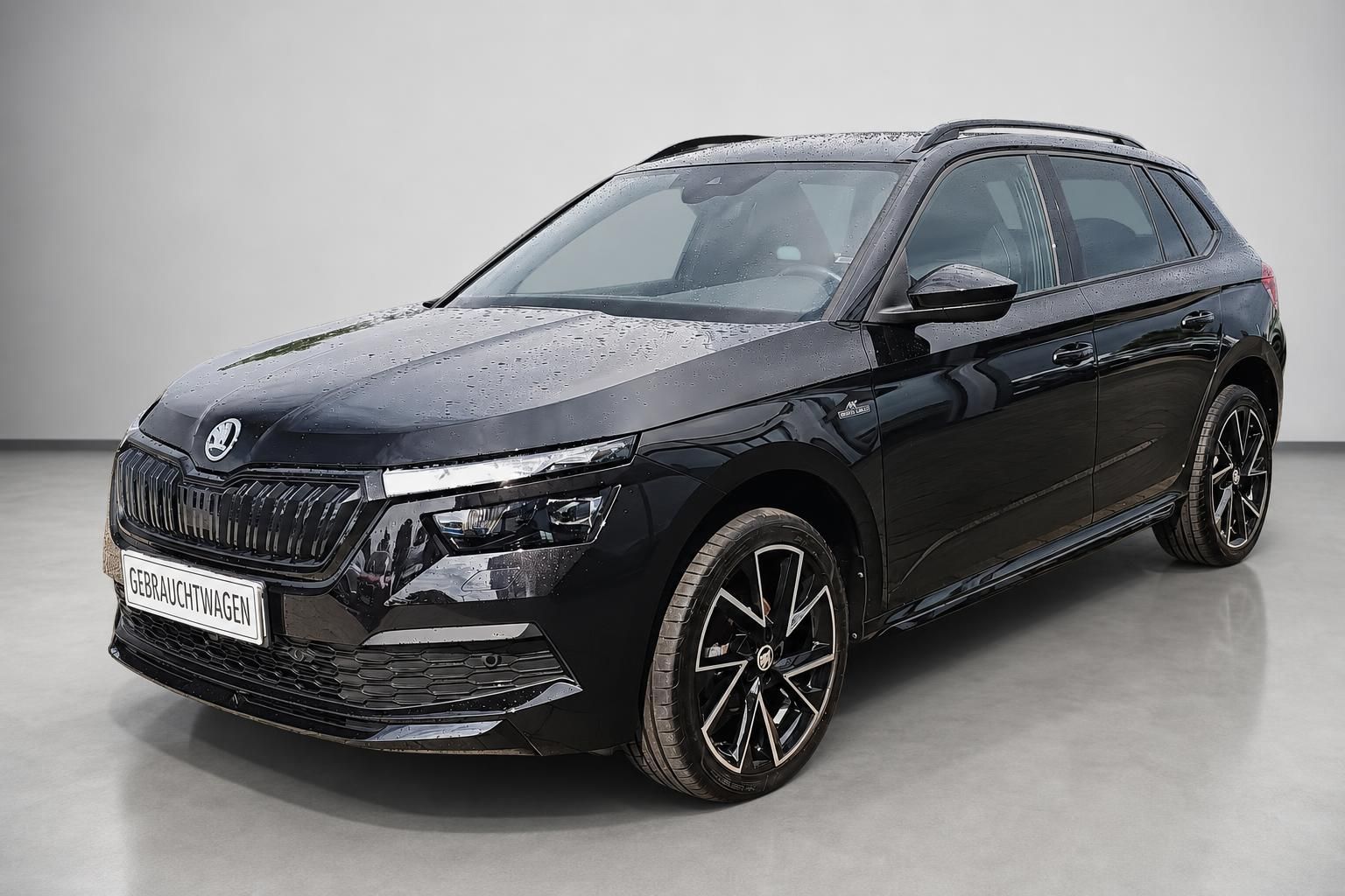 Skoda Kamiq schwarz Frontansicht Gebrauchtwagen im Regen