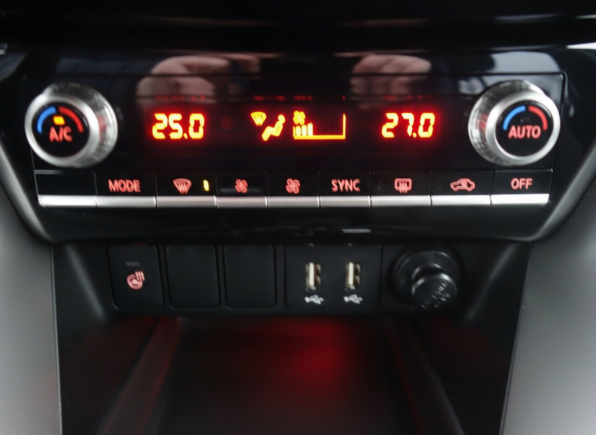 Klimaanlage-Bedieneinheit im Fahrzeuginnenraum mit Dual-Zone-Temperaturregelung 25°C und 27°C