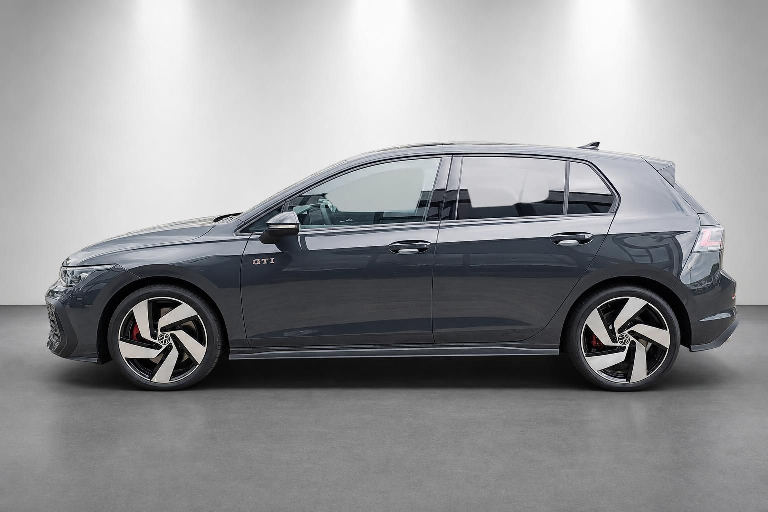 VW Golf GTI grau, Seitenansicht mit Leichtmetallfelgen