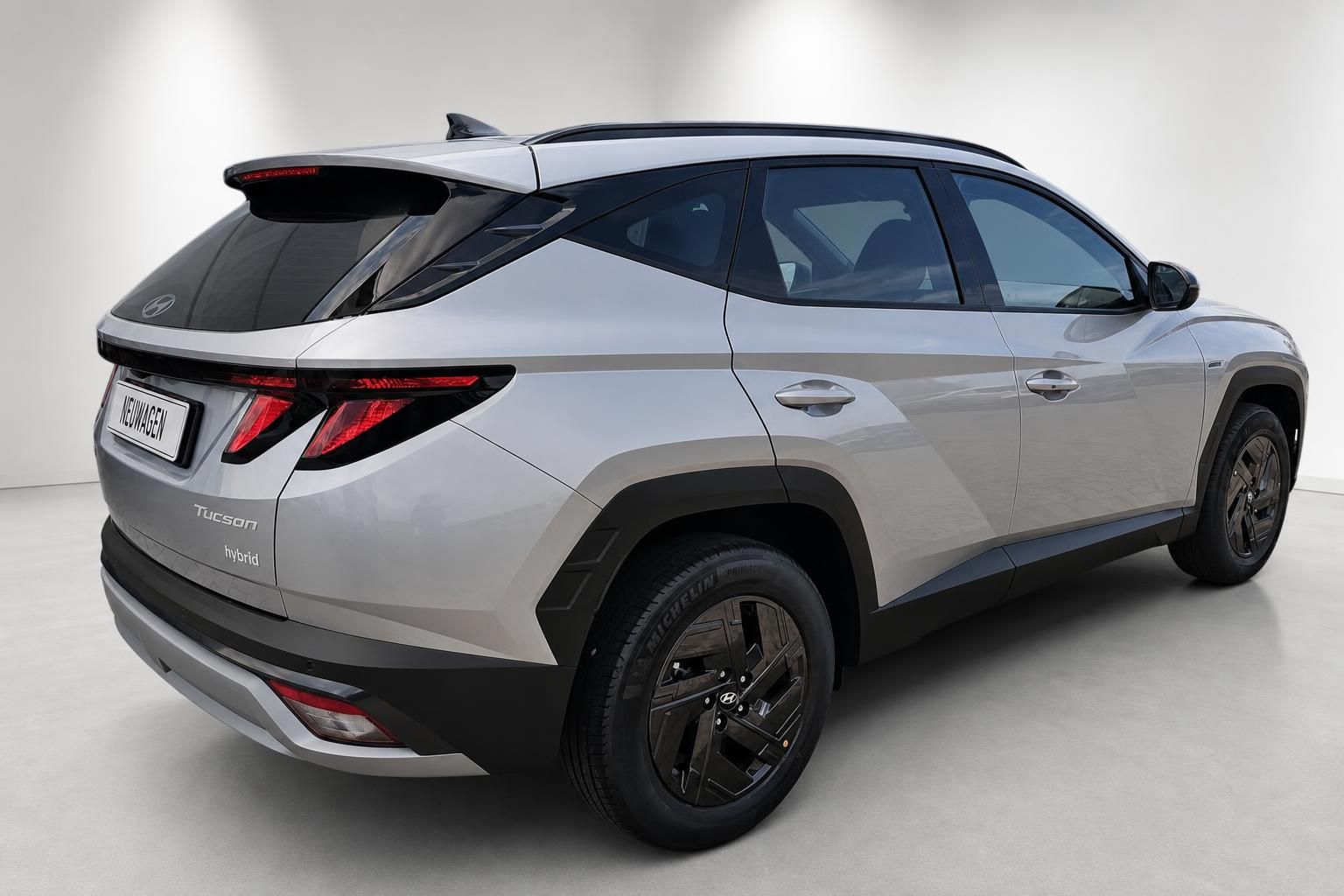 Hyundai Tucson Hybrid, Heck-Seitenansicht im Studio