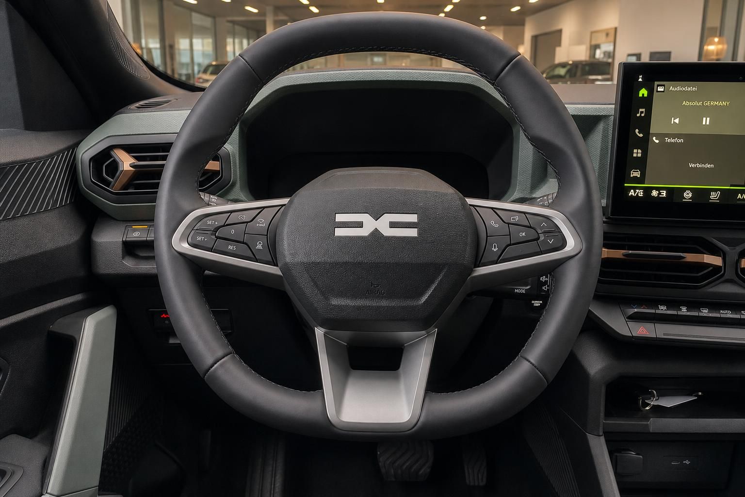 Dacia Duster Innenraum mit Lenkrad und Multimediadisplay im Detail