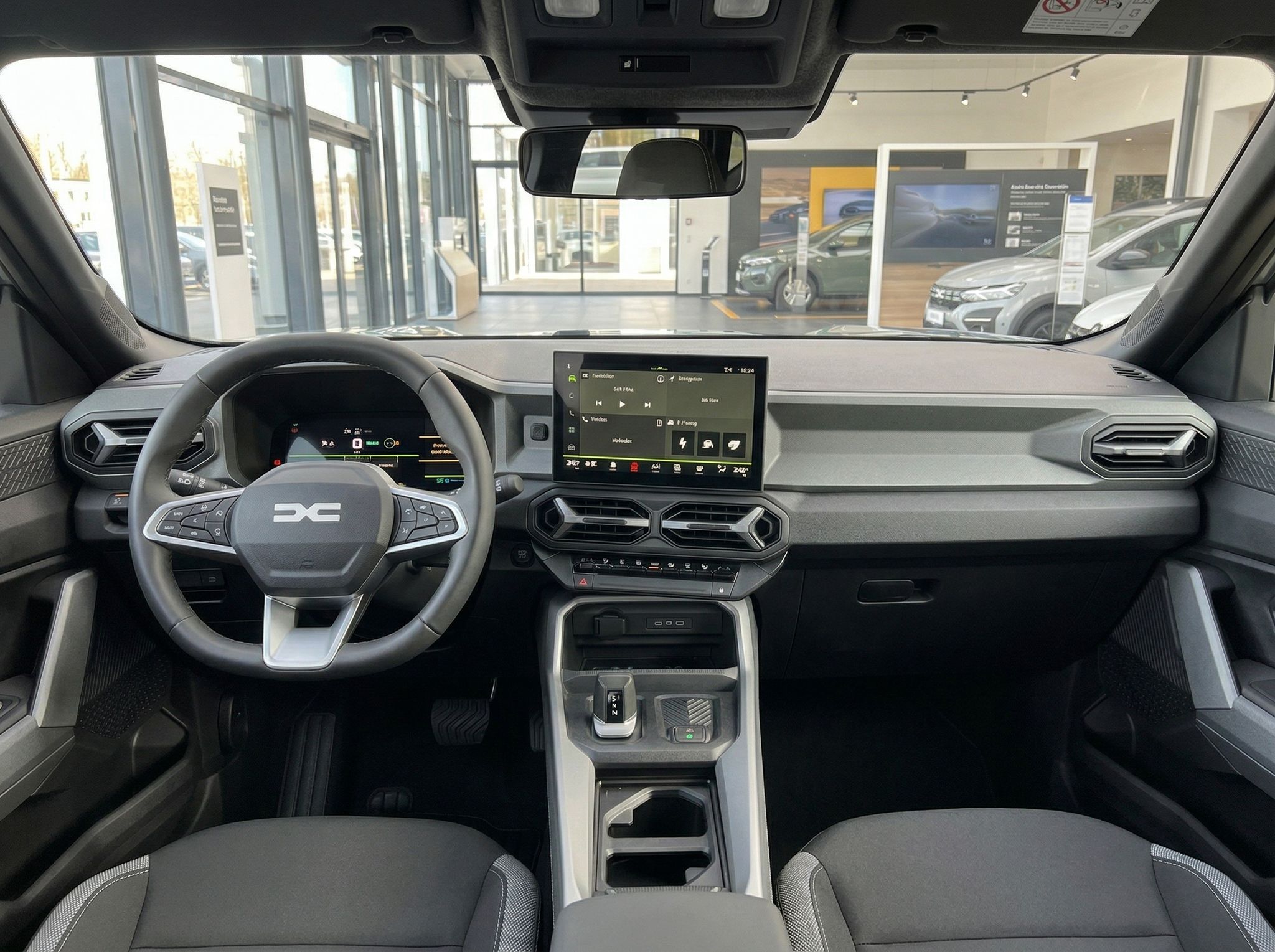 Modernes Fahrzeug-Cockpit mit digitalem Display und Lenkrad - Innenraum-Detailansicht