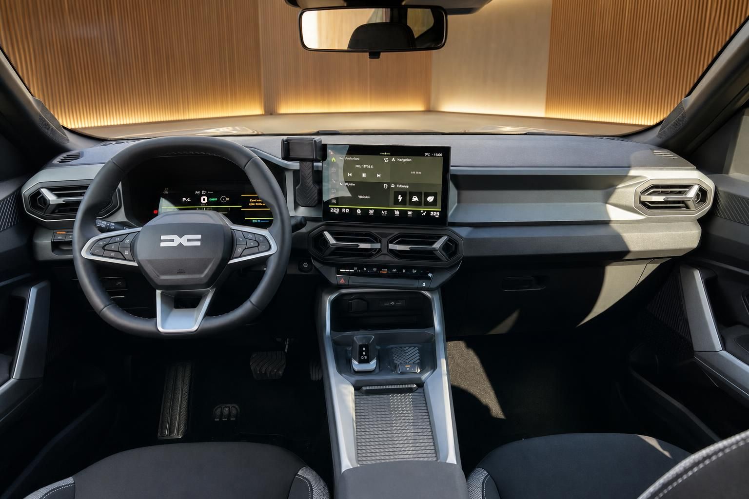 Dacia SUV Innenraum mit Lenkrad, Touchscreen-Display und modernem Armaturenbrett